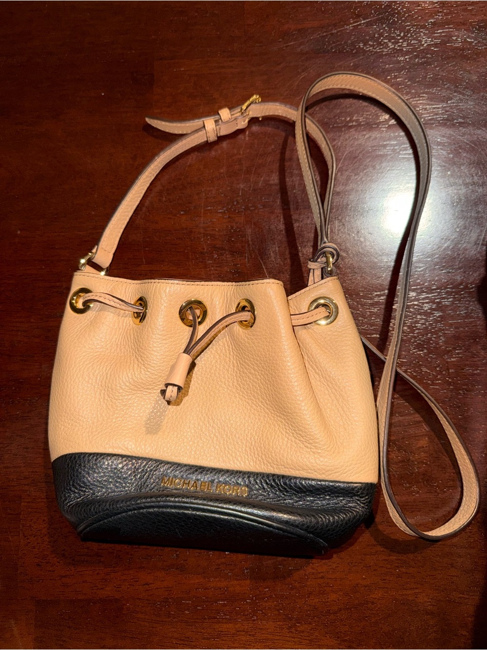 Michael Kors Beige and Black Pebbled Leather Drawstring Crossbody